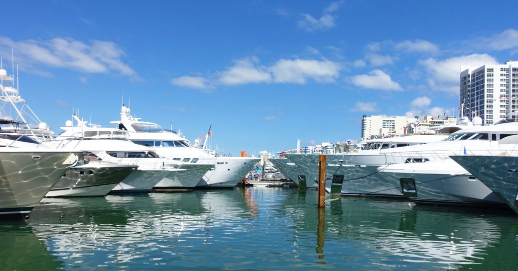 luxury yachts line up in Collins Avenue for Yachts Miami Beach 2017 