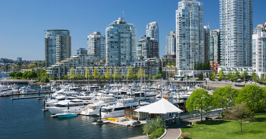 Overview of Yaletown and motor yachts berthed.