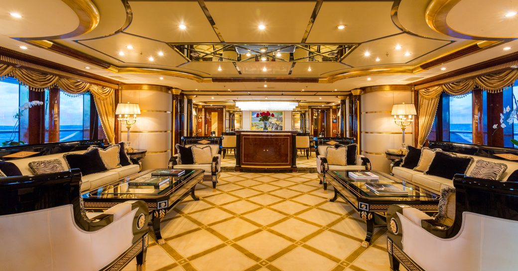 opulent lounge in the main salon of superyacht Mine Games