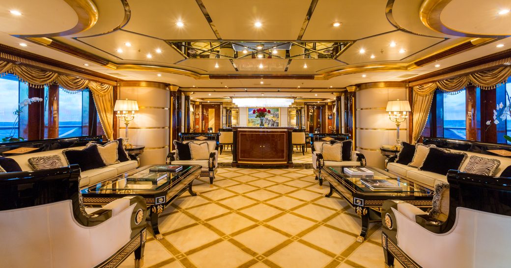 two seating areas in the main salon of motor yacht Lumiere II