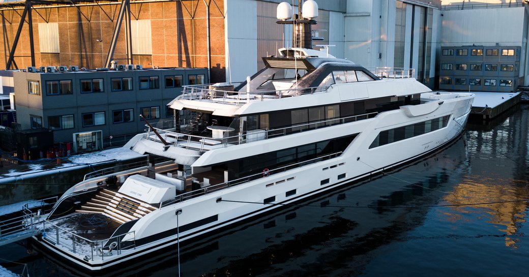 Aft view of superyacht SATEMI outside Damen Yachting facilities
