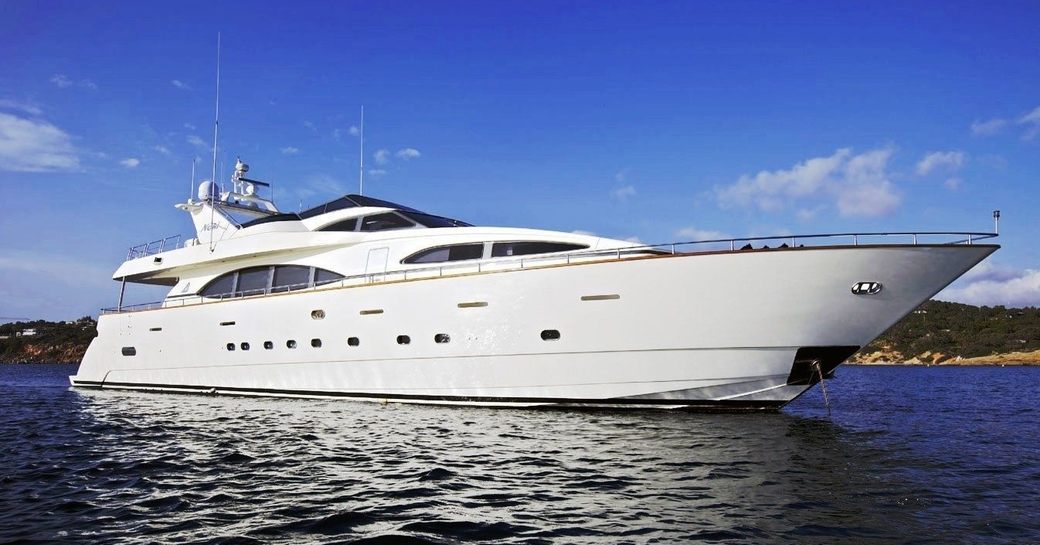 luxury yacht ‘Lady Pamela’ anchors in the idyllic Coral Sea on a private charter vacation