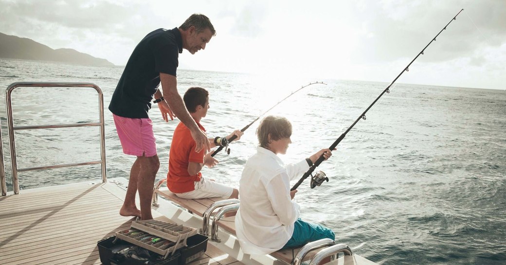 fishing on superyacht with rod and line