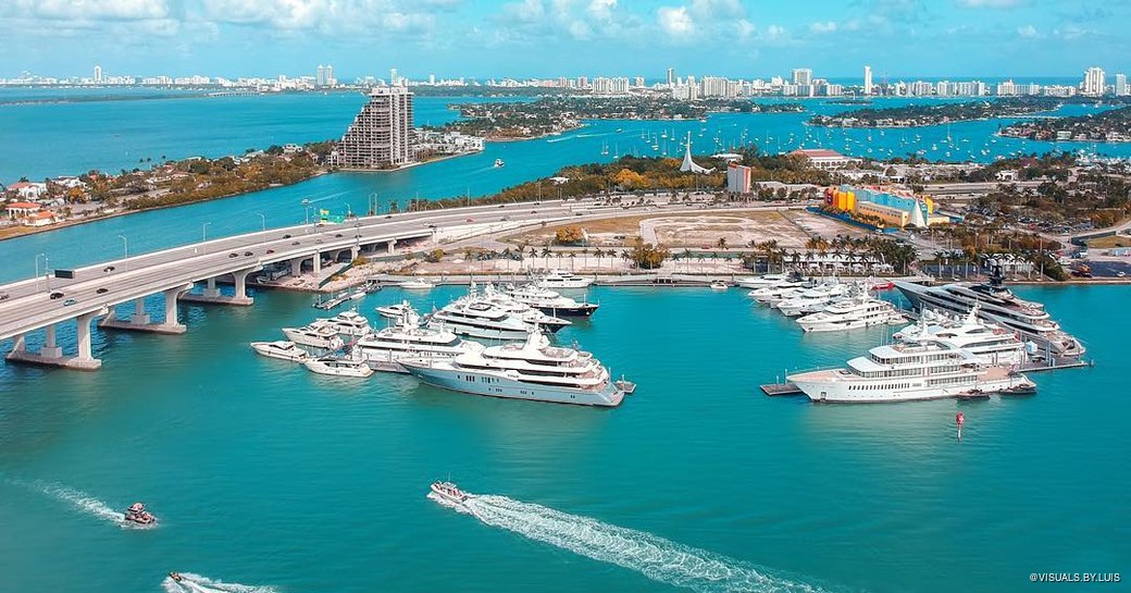 Aerial shot of Miami Yacht Show and Superyacht Miami, in downtown Miami at Biscayne Bay at One Herald Plaza and Watson Island Garden Marina