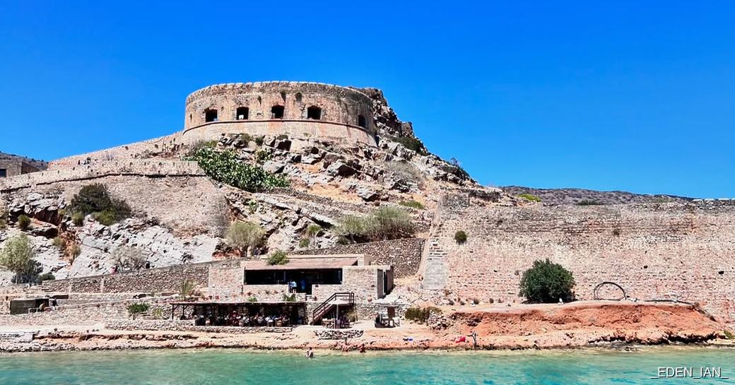 Water view of architecture on Spinalonga Island