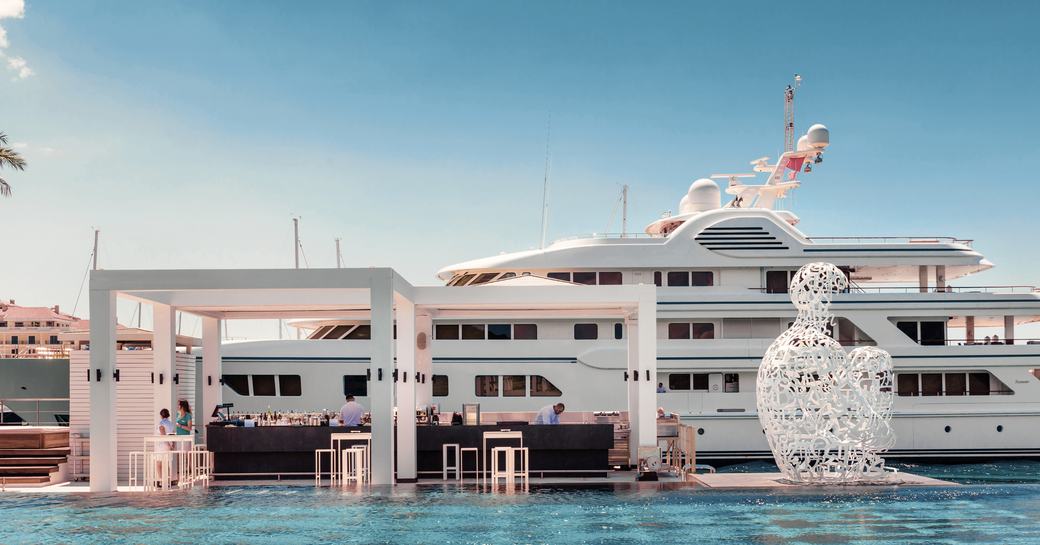 superyacht berths behind infinity pool in Porto Montenegro, Tivat