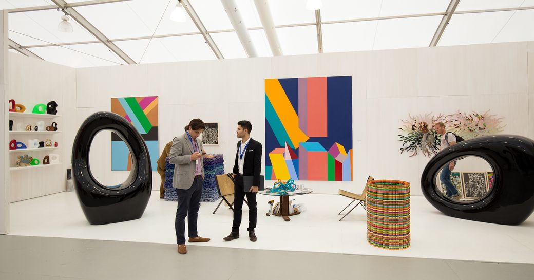 art enthusiasts and collectors gather at Art Basel Miami 