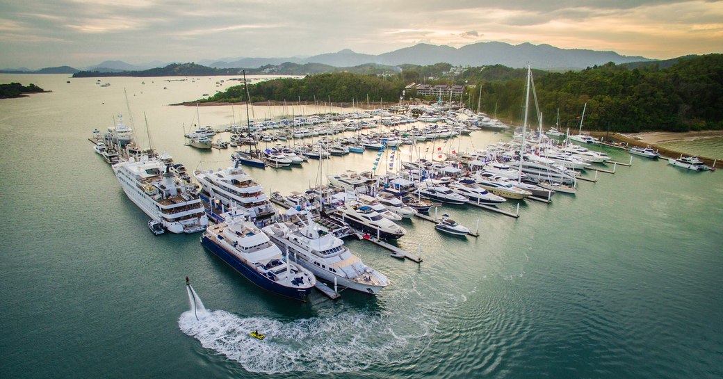 yachts and superyachts line up in Phuket Marina for the Thailand Yacht Show & Rendezvous 