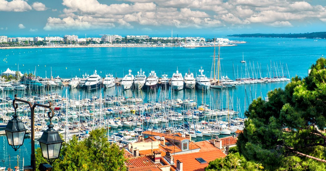 luxury yachts lined up in the Vieux Port in Cannes