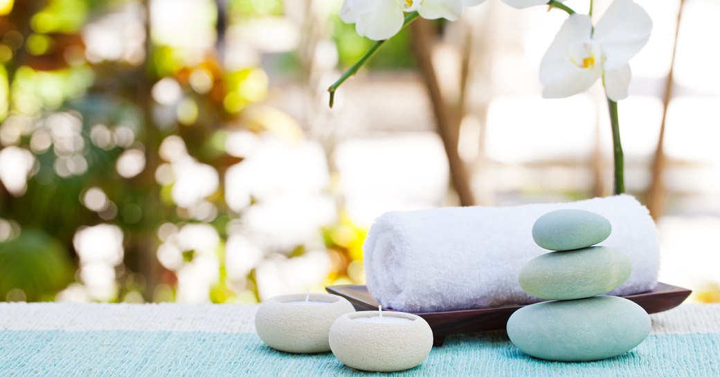 stones and candles creating relaxing ambience in a Caribbean Spa