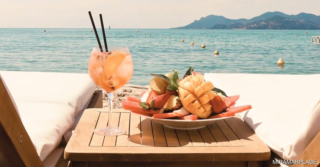 Miramar Plage Cannes beach, loungers, fruit, drink
