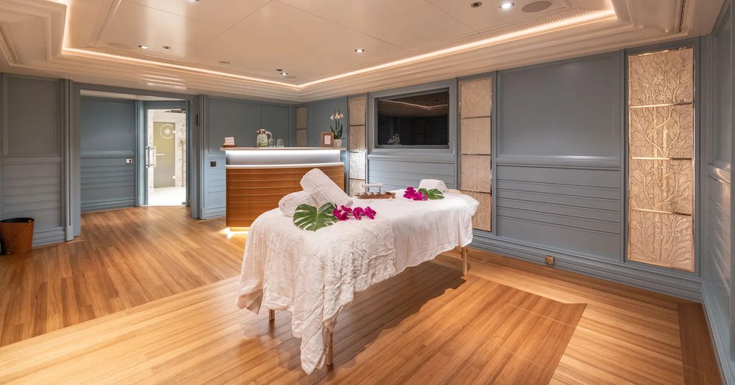 Massage room onboard charter yacht CARINTHIA VII, massage table in center 