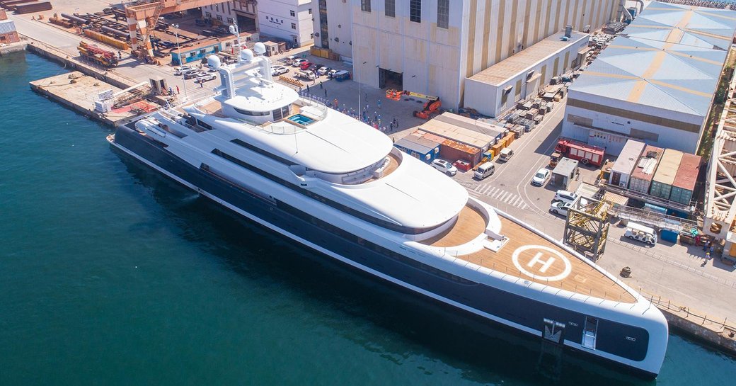 motor yacht Illusion Plus outside yard's facilities following her delivery