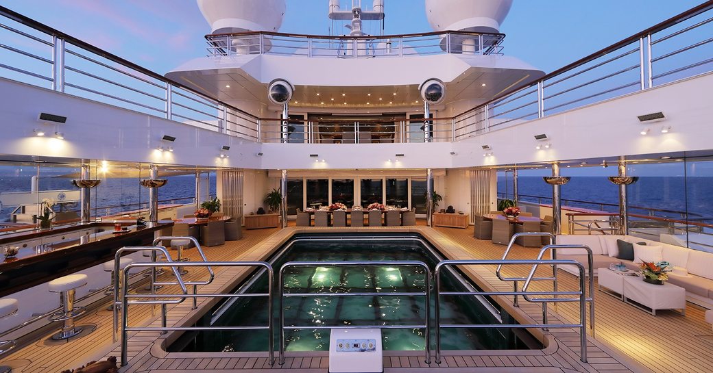 Bridge deck pool and bars onboard charter expedition yacht OCTOPUS