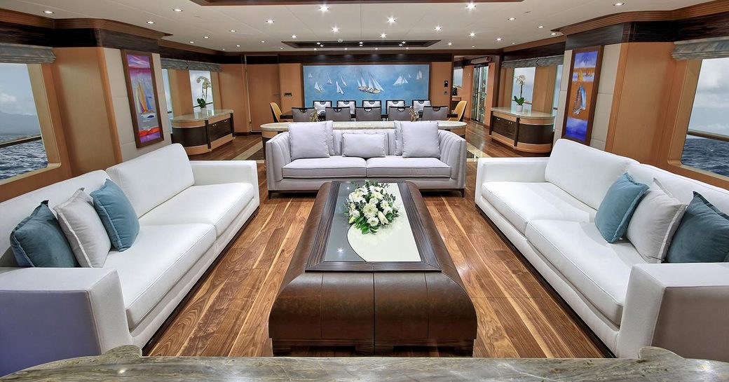 three white sofas in the main salon of motorsailer yacht MEIRA 
