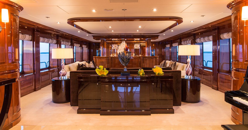 view of elegant main salon from aft deck foyer on board luxury yacht Remember When