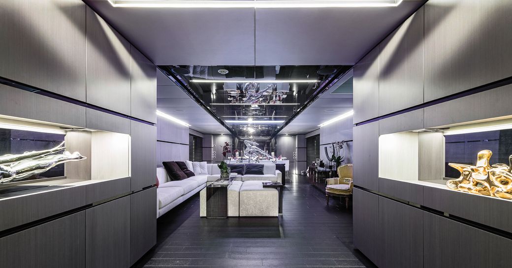 glamorous main salon with metallic walls and LED lighting on board superyacht GIRAUD