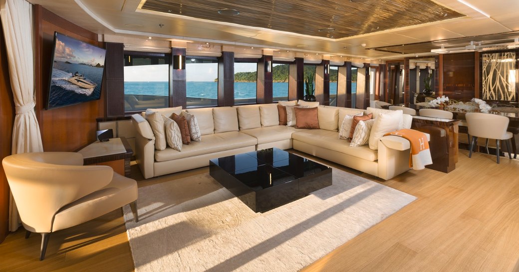 L-shaped leather sofa in the main salon of superyacht Grey Matters