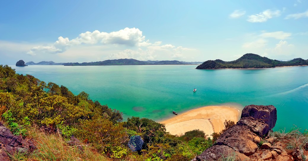 Bay in Thailand, with white sand and bright turquoise sea