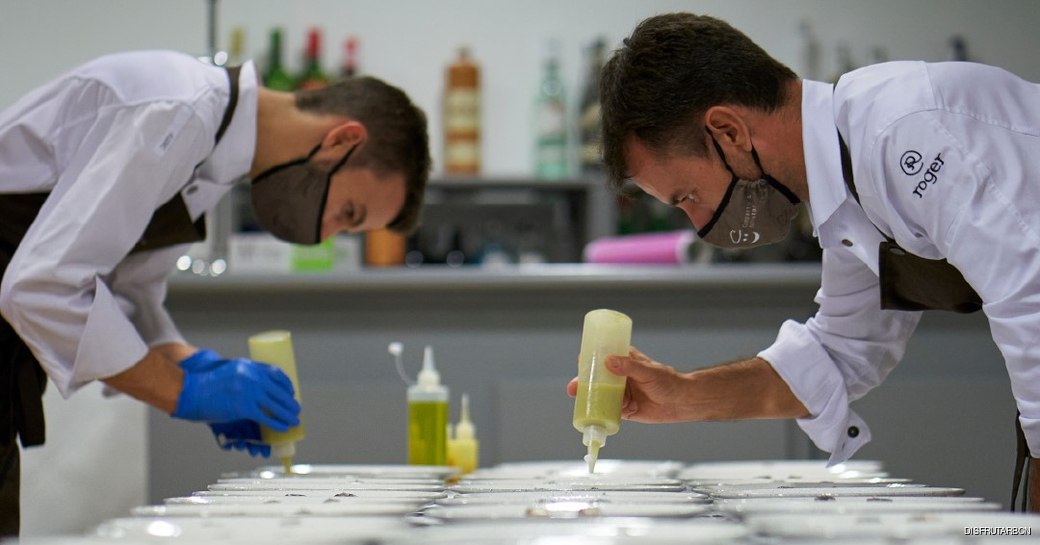 chefs at work in Barcelona restaurant disfrutar