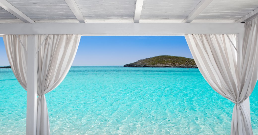 Gazebo white in Formentera Ibiza beach with turquoise sea