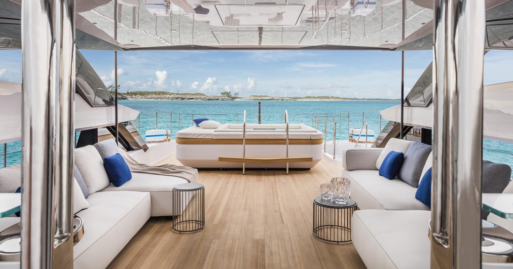 seating area and spa pool on the sundeck of luxury yacht Vista Blue