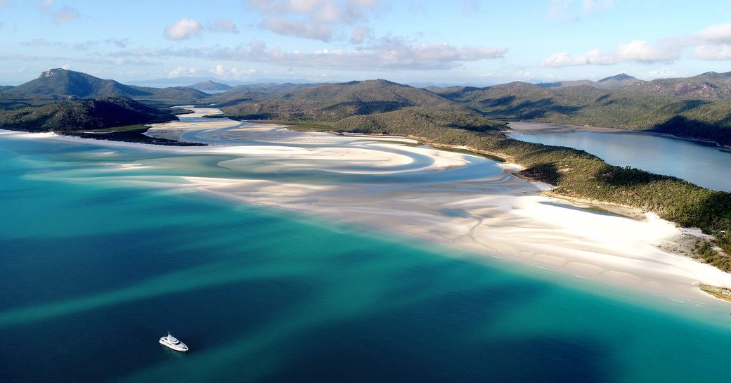 superyacht Infinity Pacific anchors off Whitsunday Island in Australia