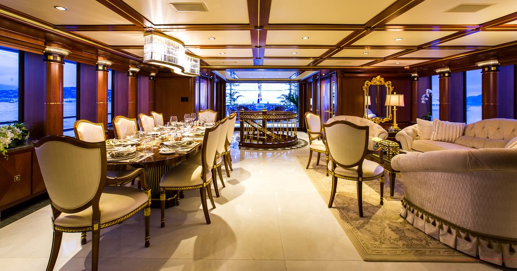 formal dining area opposite lounge in the main salon aboard superyacht My Seanna