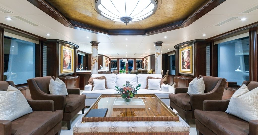 classical styled main salon with opulent details aboard charter yacht STARSHIP 