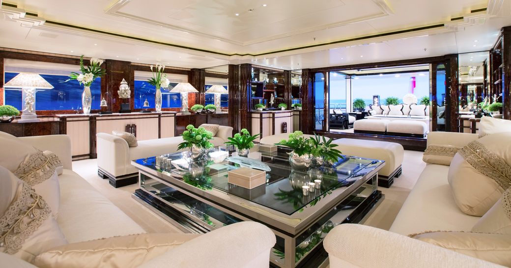 opulent lounge area forming part of the main salon aboard charter yacht ‘Lioness V’