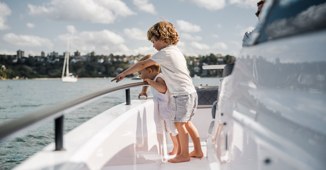 Kids onboard the Axopar Suntop chase tender