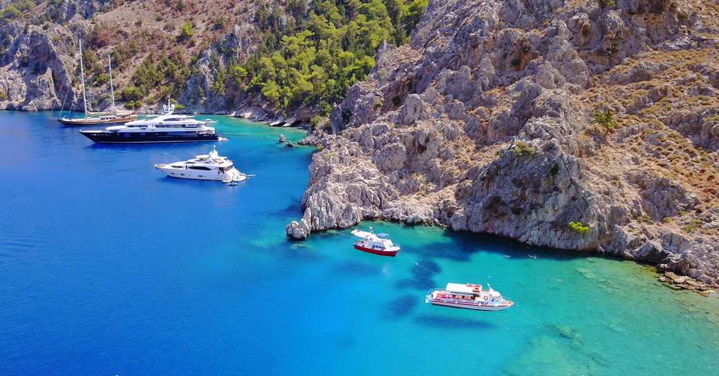 Yachts anchored in beautiful turquoise water in Greece