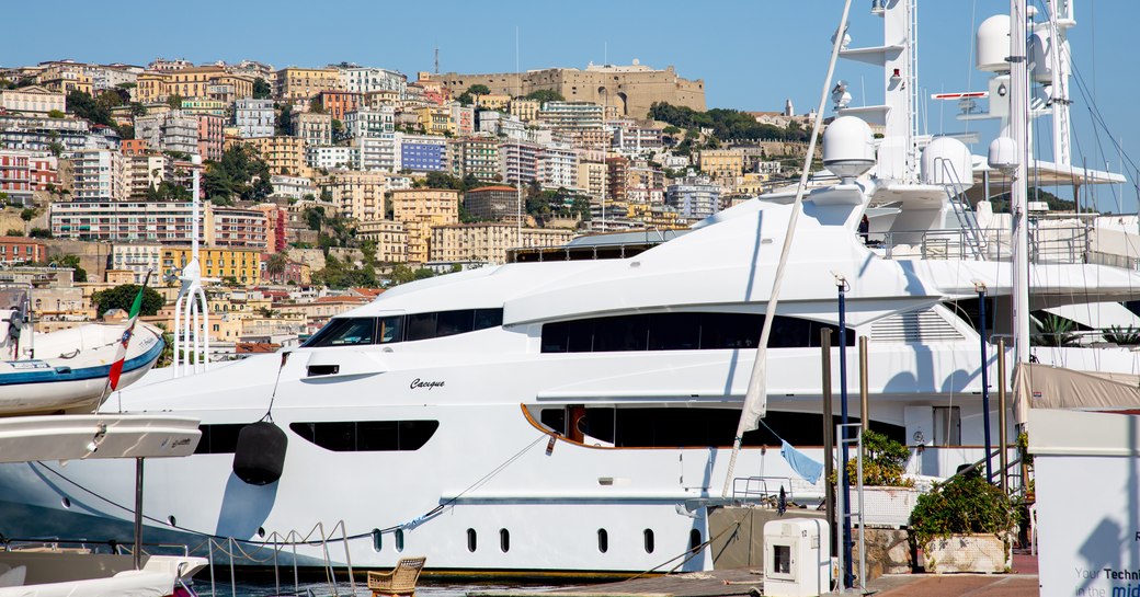 Motor yacht moored in Naples harbor, Italy