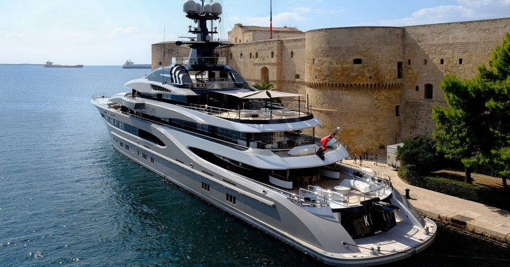 Superyacht KISMET in Taranto, Italy with buildings in background during filming of Michael Bay movie 6 Underground