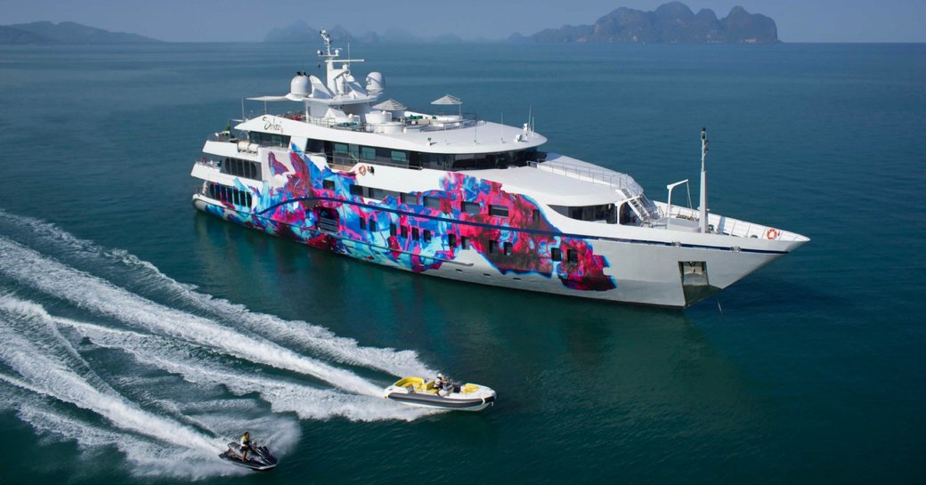 superyacht SALUZI alongside tender and jet ski on a luxury yacht charter in Thailand