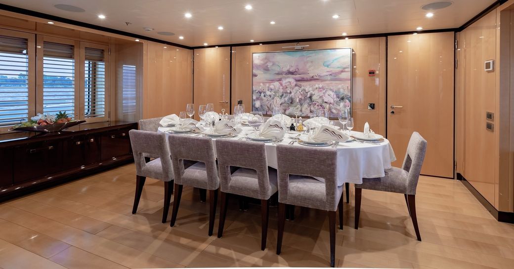 formal dining area in the main salon aboard superyacht La Mirage 
