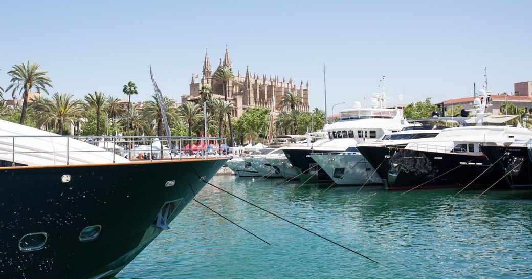 yachts lined up in Palma for the Palma Superyacht Show 2018 with the cathedral in the background