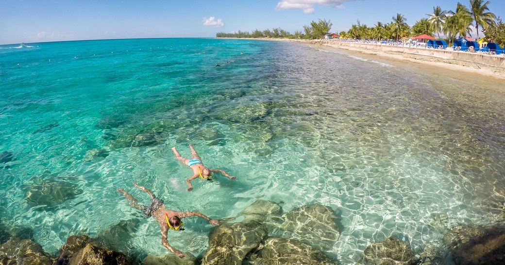 Snorkellers exploring the crystal-clear water in Eleuthera 