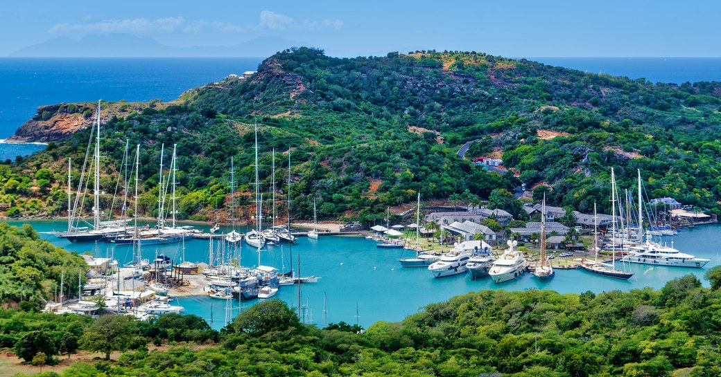 Nelson's Dockyard with multiple charter yachts berthed