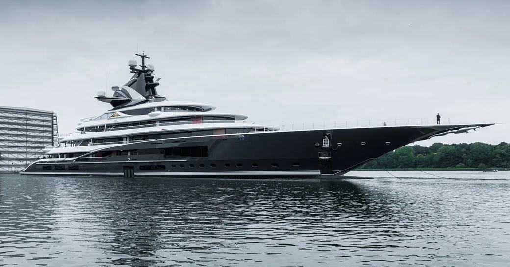 Superyacht KISMET underway on a river