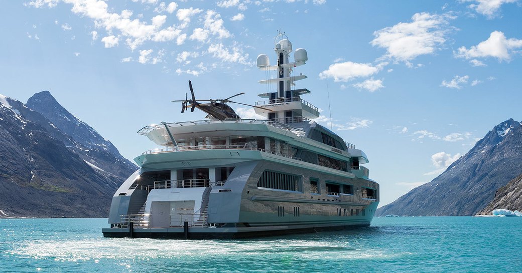 helicopter lands on the helipad aboard expedition yacht CLOUDBREAK 