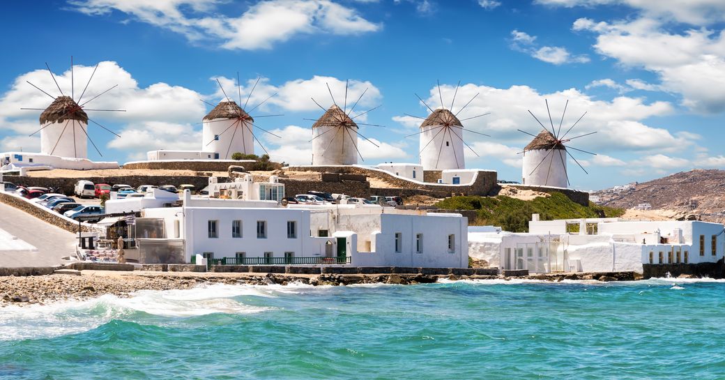 Cycladic windmills lining the coast of Mykonos