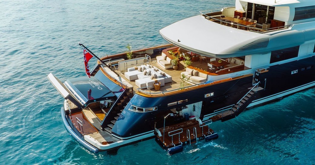 Overview of the beach club and aft decks onboard private yacht charter GALILEO