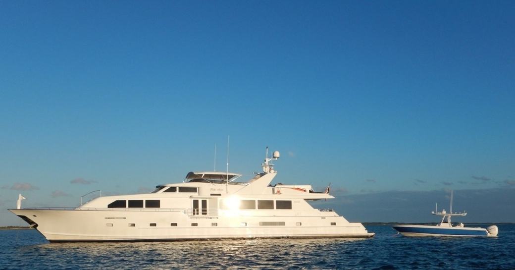 superyacht ‘Kelly Anne’ docks alongside tender on a luxury yacht charter in the Bahamas