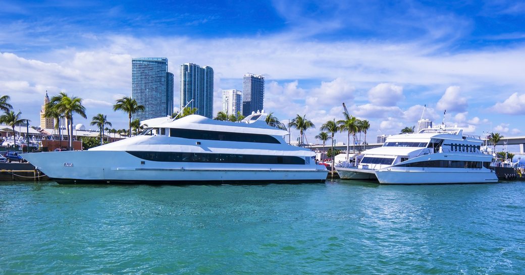 Three charter yachts berthed in Miami during the Miami International Boat Show