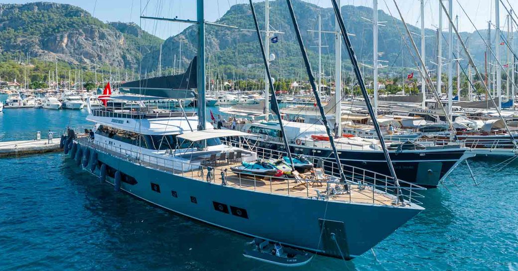 Charter yacht NORTH WIND berthed alongside more sailing yacht charters