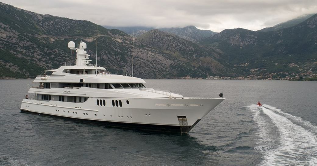 Charter yacht TRIDENT at anchor with water toys