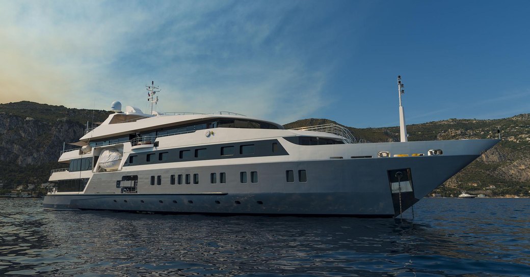 superyacht SERENITY from Austal anchors during a luxury yacht charter