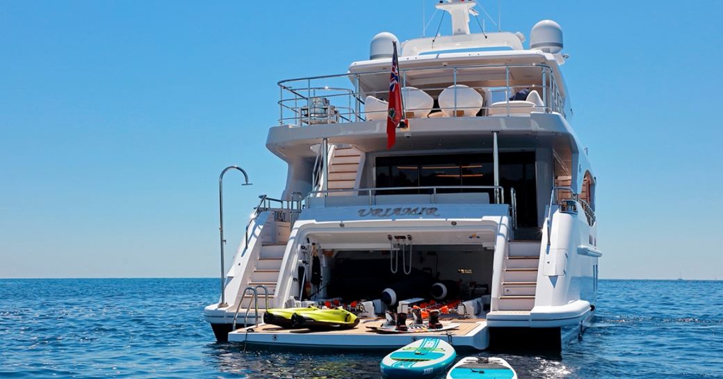 swim platform on board motor yacht URIAMIR with garage open and water toys out on display