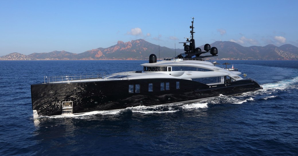 dynamic profile of superyacht OKTO as she cruises on a luxury yacht OKTO